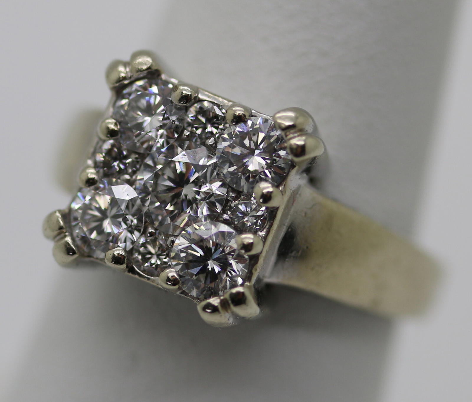 Fantasy Diamond Corp. (Pat.6591633) 14K White Gold 9 Diamonds Ring (Size 7) NICE