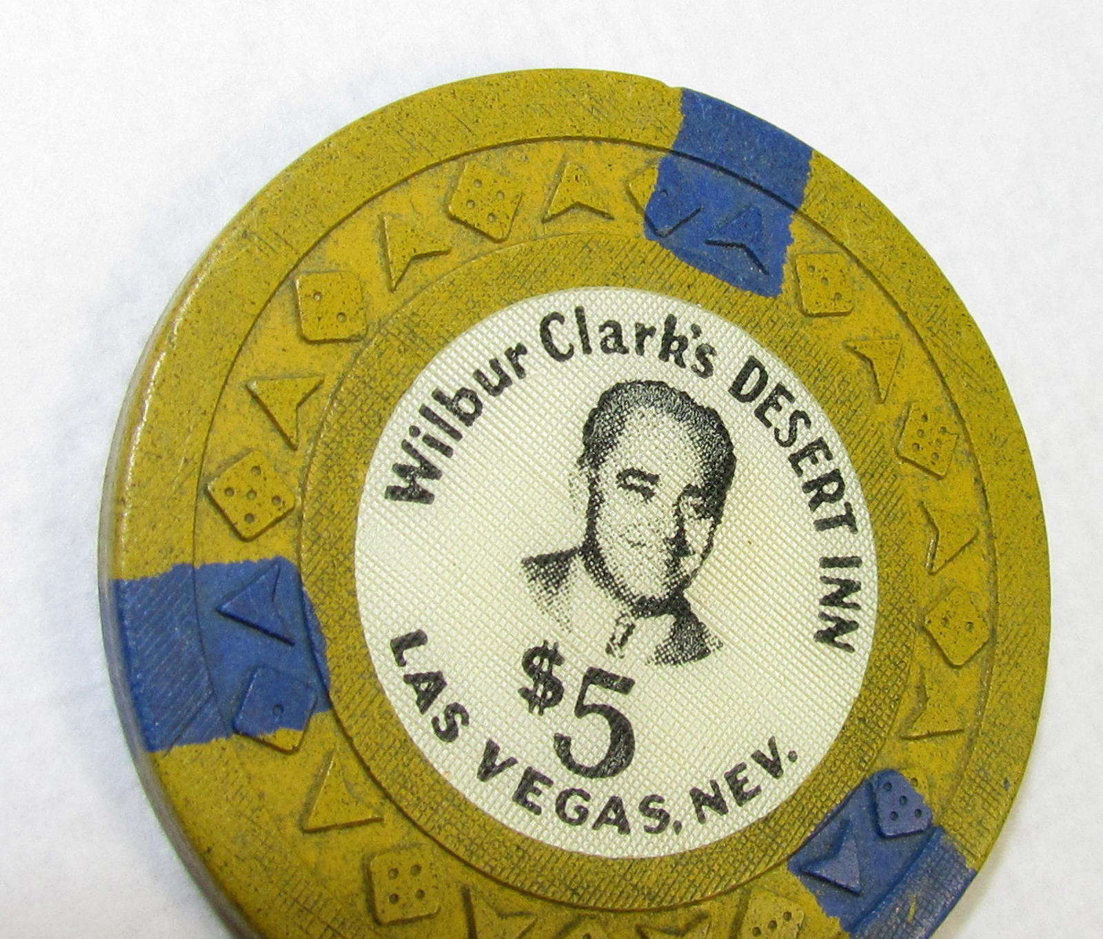 Las Vegas, NV Casino Chip: Wilbur Clark’s Desert Inn $5 Arodie Mustard / Blue R9